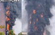 Hiện trường vụ cháy tòa nhà chọc trời chấn động ở Trung Quốc