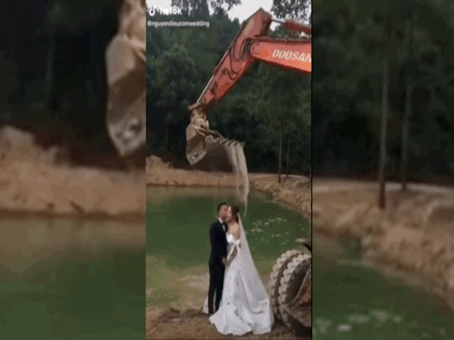 Video: Dùng máy xúc để tạo dáng chụp ảnh cưới như thác nước